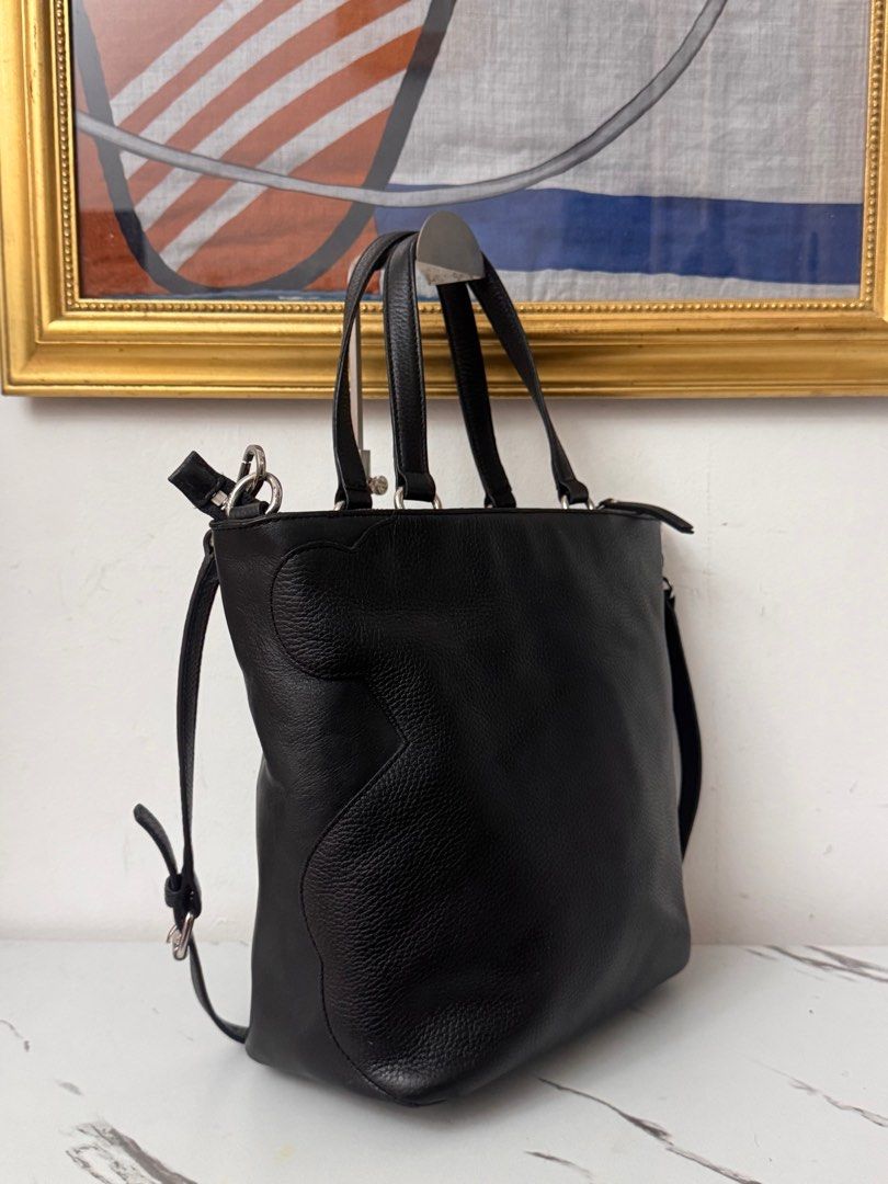 Tous genuine leather 2way bag (Category: Luxury Bags & Wallets) located in Rizal. Submitted by houseofbell (Listing ID 1406518019, Image 3). Description: Excellent condition No flaws Made genuine leather material 11.5x13 inches.