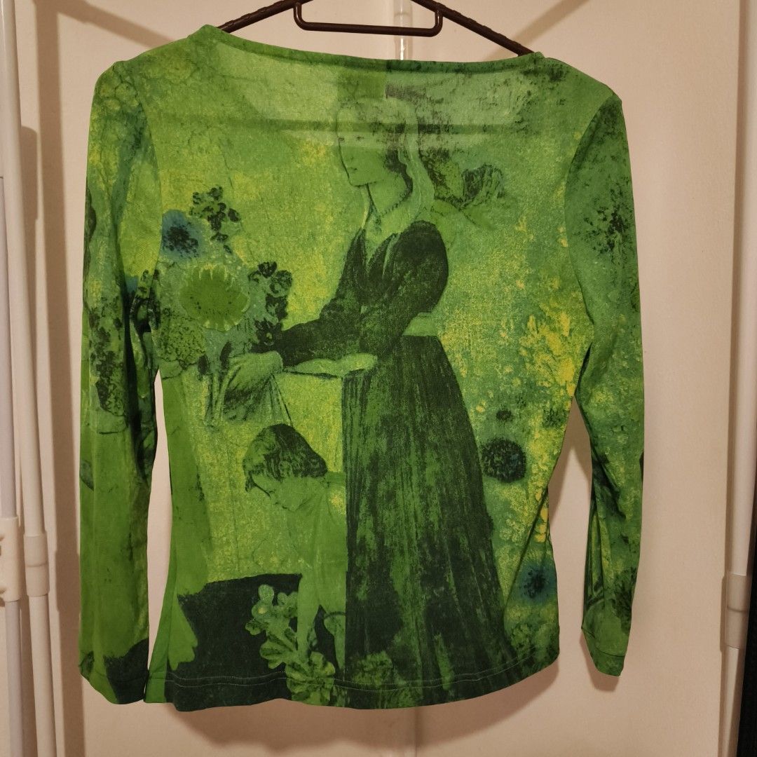 Vintage mesh top (Category: Longsleeves) located in Caloocan City. Submitted by huntpicked (Listing ID 1406480176, Image 2). Description: - Long-sleeved top with a unique green art print. - Features a round neckline. - Fitted silhouette. - Lightweight fabric, mesh. - fits medium to semi large frame..