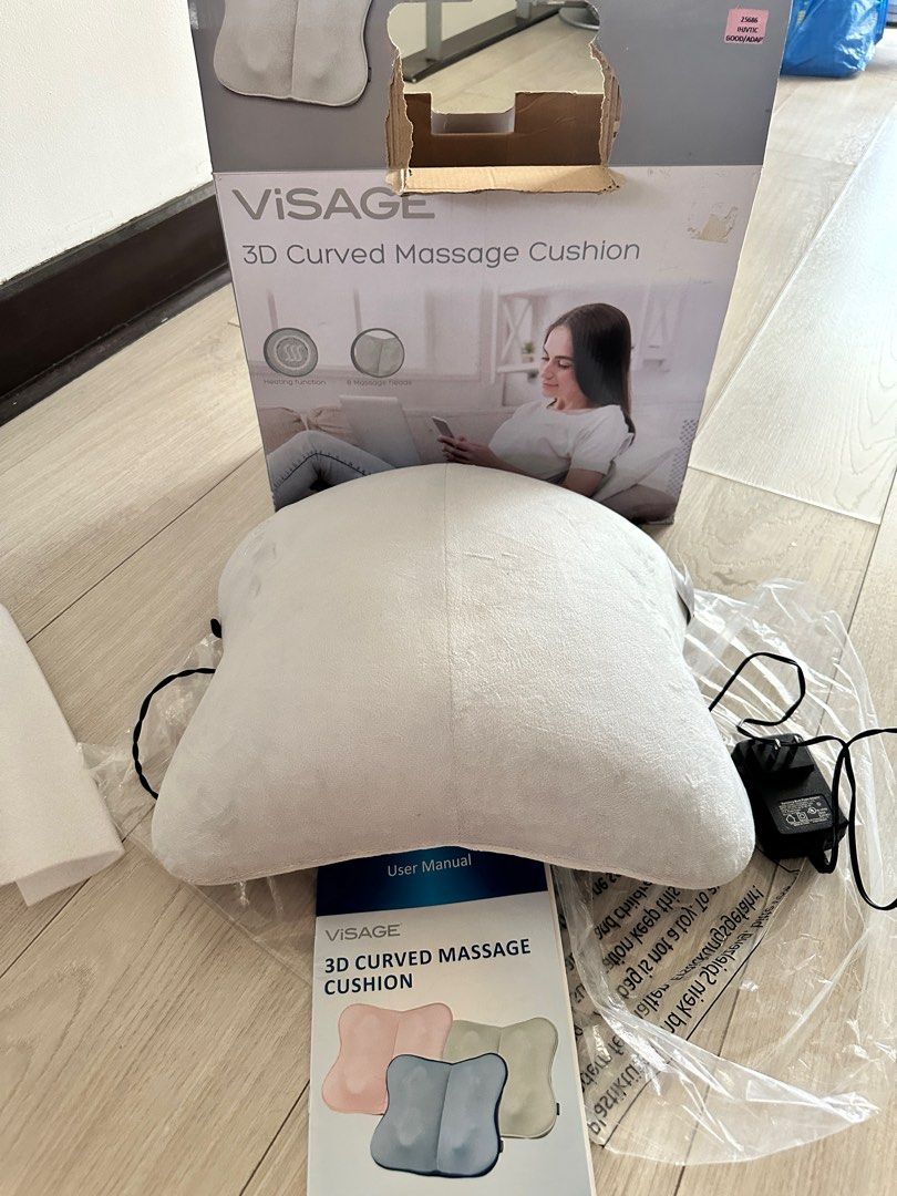 Visage 3D Curved Massage Cushion (Category: Massage Devices) located in Taguig. Submitted by heytreasure (Listing ID 1406466568, Image 3). Description: Visage 3D Curved Shiatsu Massage Cushion — ₱1,200 Only Brand new unit. Box is old and damaged. See photos for condition. This is the Visage massage cushion (Aldi Australia brand). ⭐ Condition • Unit is brand new / never used • Box is very old and ripped (cosmetic only — see photos) • Tested for fu