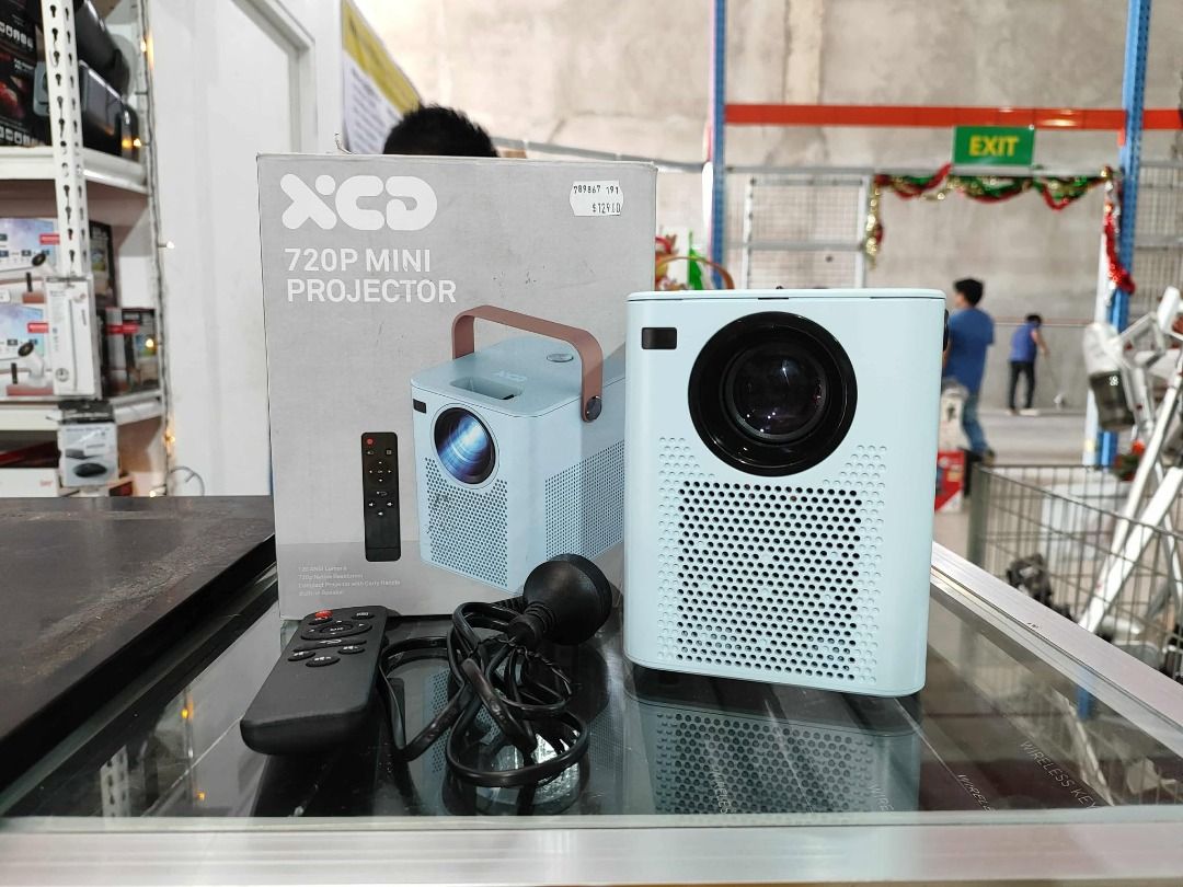 XCD 720P Mini Projector (Category: Projectors) located in Muntinlupa City. Submitted by shopandsaveau (Listing ID 1406185491, Image 2). Description: XCD 720P MINI PROJECTOR Surplus from Australia Regular Price: P2,900 120 ANSI Lumens 720P Native Resolution Built-in Speaker HDMI USB Media Playback Message if interested. You can check in store or have it delivered. Location: No. 30 Kengi Marketing, RMT Industrial Complex, Tunasan, Muntinlupa, Metro