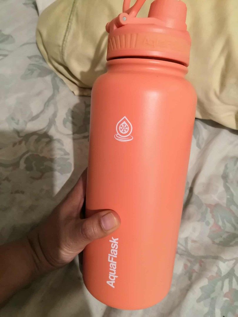 AquaFlask 32oz Insulated Water Bottle (Category: Water Bottles & Tumblers) located in Muntinlupa City. Submitted by blessed_ming.ph (Listing ID 1406680944, Image 1). Description: - AquaFlask 32oz insulated water bottle - Stylish coral color - Convenient flip-top lid - - BPA-free - Vacuum-insulated for temperature retention - 946ml capacity - Designed in California - no dents, no issues -used ones, .