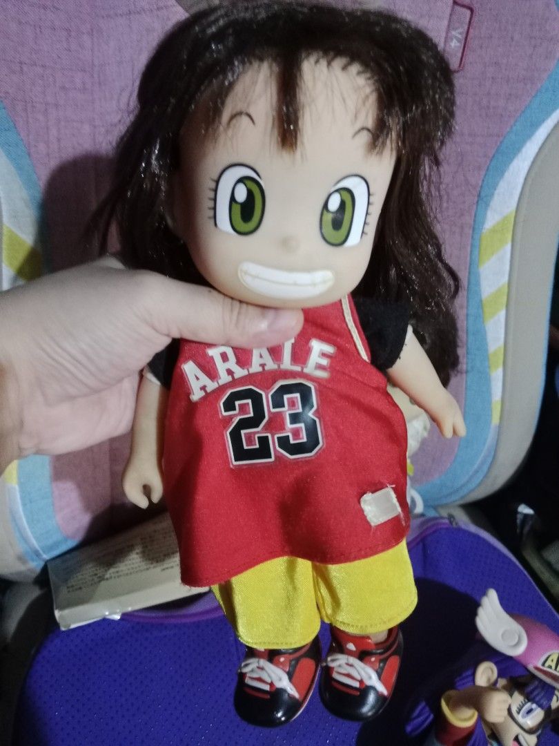 Arale Norimaki Dolls (Category: Figurines & Statues) located in Muntinlupa City. Submitted by periwinklefairy23 (Listing ID 1406690736, Image 3). Description: - Arale Norimaki doll set - Includes three dolls: - Red basketball jersey - White dress - Overalls and glasses - Dolls have detailed facial features - Great for collectors and fans!.