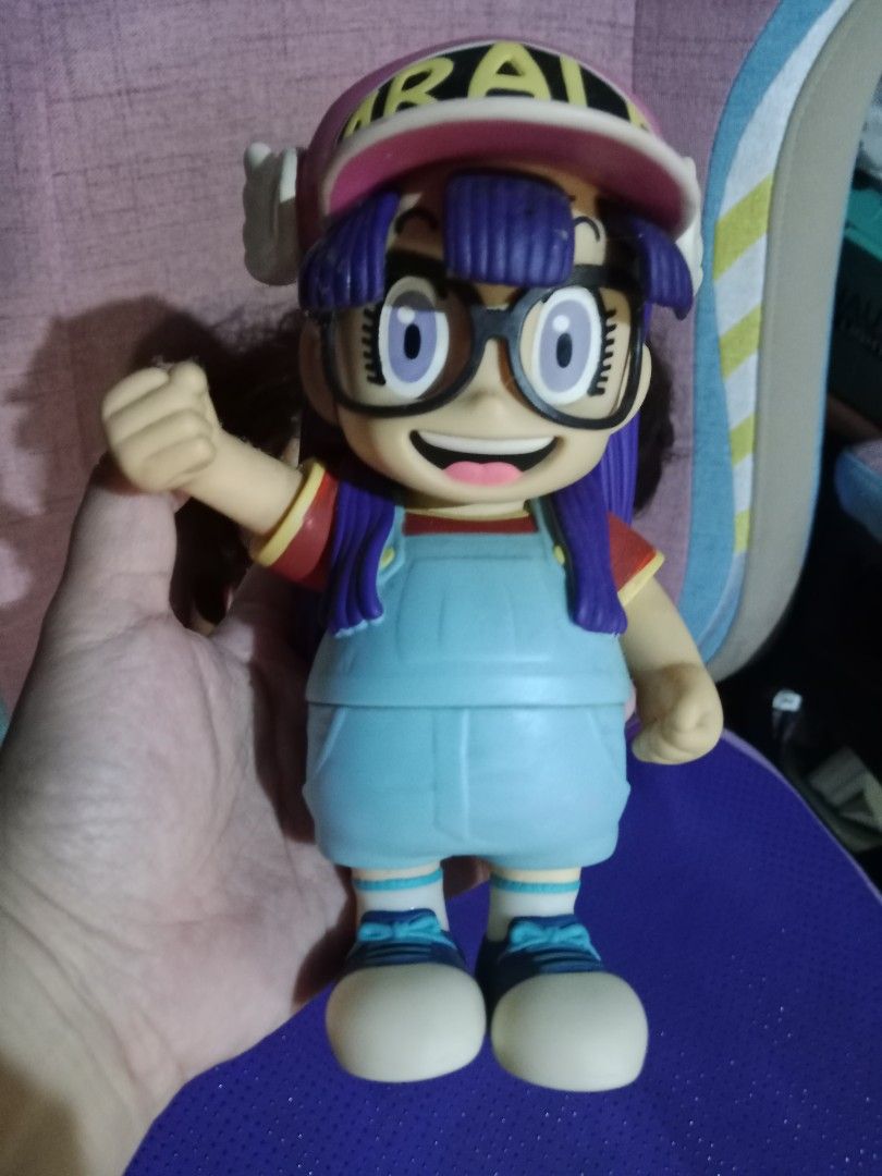 Arale Norimaki Dolls (Category: Figurines & Statues) located in Muntinlupa City. Submitted by periwinklefairy23 (Listing ID 1406690736, Image 2). Description: - Arale Norimaki doll set - Includes three dolls: - Red basketball jersey - White dress - Overalls and glasses - Dolls have detailed facial features - Great for collectors and fans!.