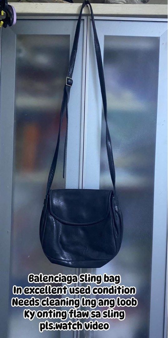 Balenciaga Sling Bag (Category: Luxury Bags & Wallets) located in Pasacao. Submitted by wengpullar37205 (Listing ID 1406777644, Image 1). Description: - Black Balenciaga sling bag - Flap closure - Adjustable strap - Needs cleaning inside - Minor flaw on sling pro konte lng po.