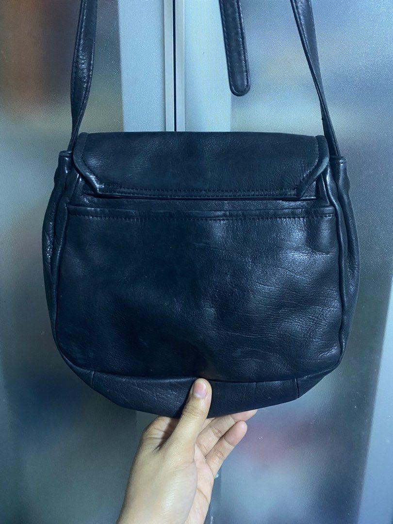 Balenciaga Sling Bag (Category: Luxury Bags & Wallets) located in Pasacao. Submitted by wengpullar37205 (Listing ID 1406777644, Image 3). Description: - Black Balenciaga sling bag - Flap closure - Adjustable strap - Needs cleaning inside - Minor flaw on sling pro konte lng po.