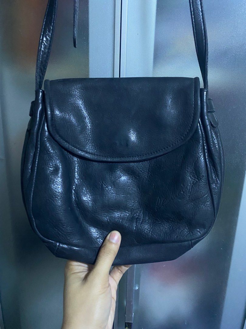 Balenciaga Sling Bag (Category: Luxury Bags & Wallets) located in Pasacao. Submitted by wengpullar37205 (Listing ID 1406777644, Image 2). Description: - Black Balenciaga sling bag - Flap closure - Adjustable strap - Needs cleaning inside - Minor flaw on sling pro konte lng po.