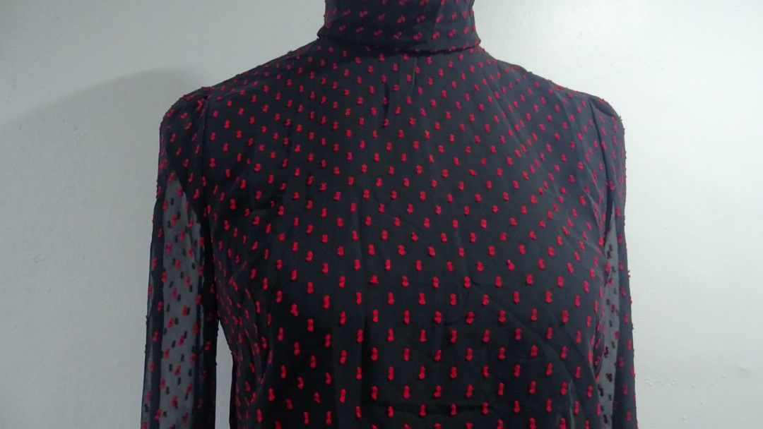 Black Sheer Long Sleeves (Category: Blouses) located in Bulacan. Submitted by aarchive (Listing ID 1406660886, Image 1). Description: - Black sheer long sleeves turtleneck blouse with red bow-like embroideries - Button-up detail on front and back - Perfect for a sophisticated look Fits Small to Medium MOP: Gcash/MAYA/BPI Shipping fee is shouldered by Buyer. Courier: J&T/Lalamove.