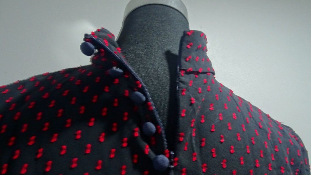 Black Sheer Long Sleeves (Category: Blouses) located in Bulacan. Submitted by aarchive (Listing ID 1406660886, Image 3). Description: - Black sheer long sleeves turtleneck blouse with red bow-like embroideries - Button-up detail on front and back - Perfect for a sophisticated look Fits Small to Medium MOP: Gcash/MAYA/BPI Shipping fee is shouldered by Buyer. Courier: J&T/Lalamove.