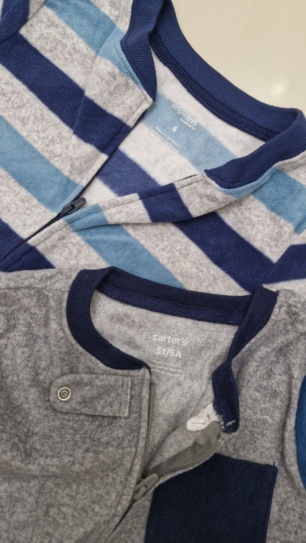 Carter's Simple Joys Sleepers (Category: Babies & Kids Fashion) located in Malolos. Submitted by prelovedclothes_stuff (Listing ID 1406770108, Image 1). Description: - Two Carter's Simple Joys sleepers - Gray sleeper with navy trim, size 5/5A - Blue and white striped sleeper, size 6 - Both sleepers have footies - "Simple Joys by Carter's" printed on soles like new pwede pa pang gift.