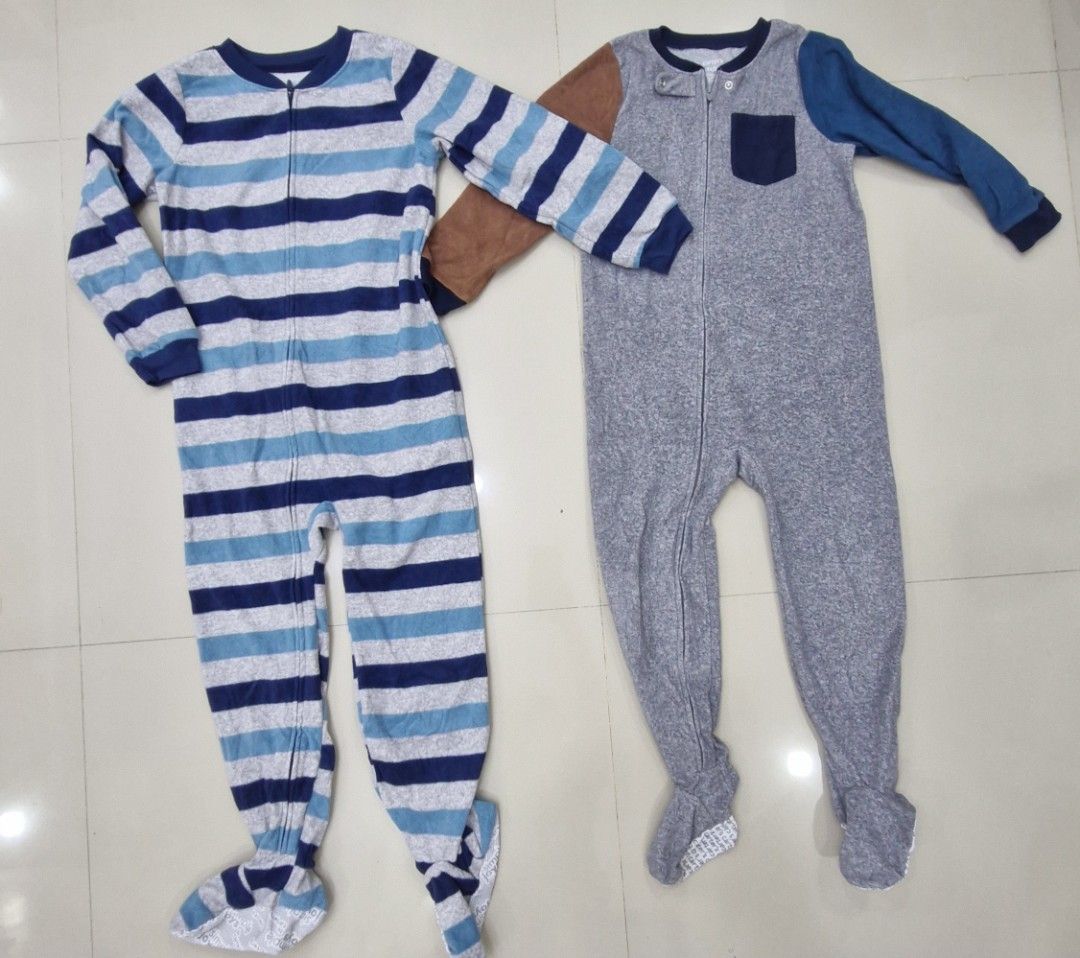 Carter's Striped and Grey Footed Pajamas (Category: Babies & Kids Fashion) located in Malolos. Submitted by prelovedclothes_stuff (Listing ID 1406770199, Image 1). Description: - Two pairs of Carter's footed pajamas - Pair 1: Blue and white stripes, blue cuffs and feet, full-length zipper - Pair 2: Grey with navy pocket and blue/brown sleeves, grey feet with white trim, full-length zipper.
