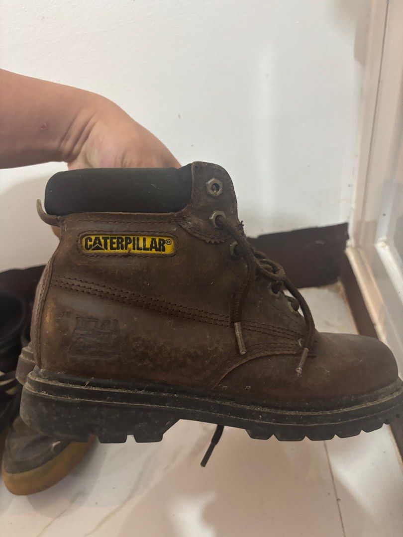 Caterpillar Brown Leather Boots (Category: Boots) located in Baguio. Submitted by usedcondition (Listing ID 1406765778, Image 2). Description: - Brown Caterpillar leather boots - Lace-up design - Padded collar - Caterpillar logo detail - Durable soles - Suitable for work/outdoor activities.