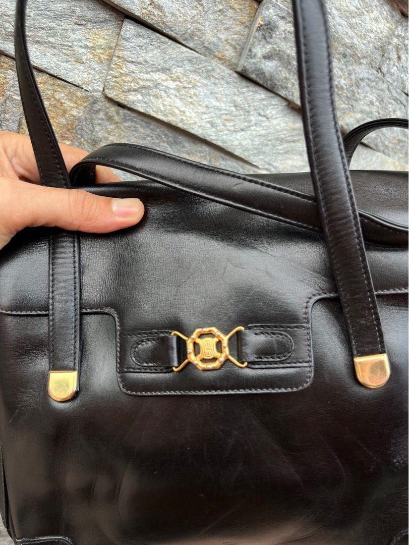 Celine Triomphe Handbag (Category: Luxury Bags & Wallets) located in Bacolod City. Submitted by novymae23 (Listing ID 1406789489, Image 2). Description: Celine Triomphe Handbag in Excellent Condition Minor Sign lf usage Authentic 100%.