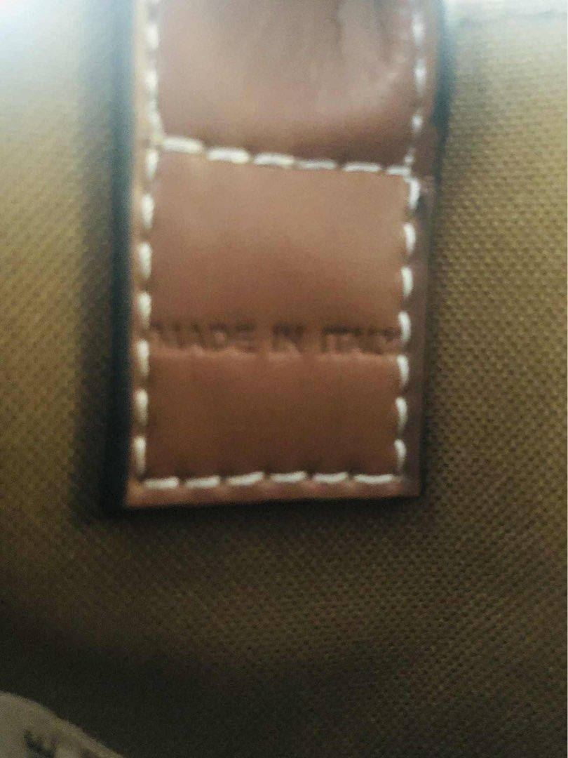Celine Vertical Triomphe Handbag (Category: Luxury Bags & Wallets) located in Dagupan City. Submitted by againandadorned (Listing ID 1406730262, Image 3). Description: - Authentic Celine Vertical Triomphe handbag - Features brown leather handle and strap - Celine logo displayed - Made in Italy - Light brown interior - Rectangular shape - Classic design - Perfect for everyday use.