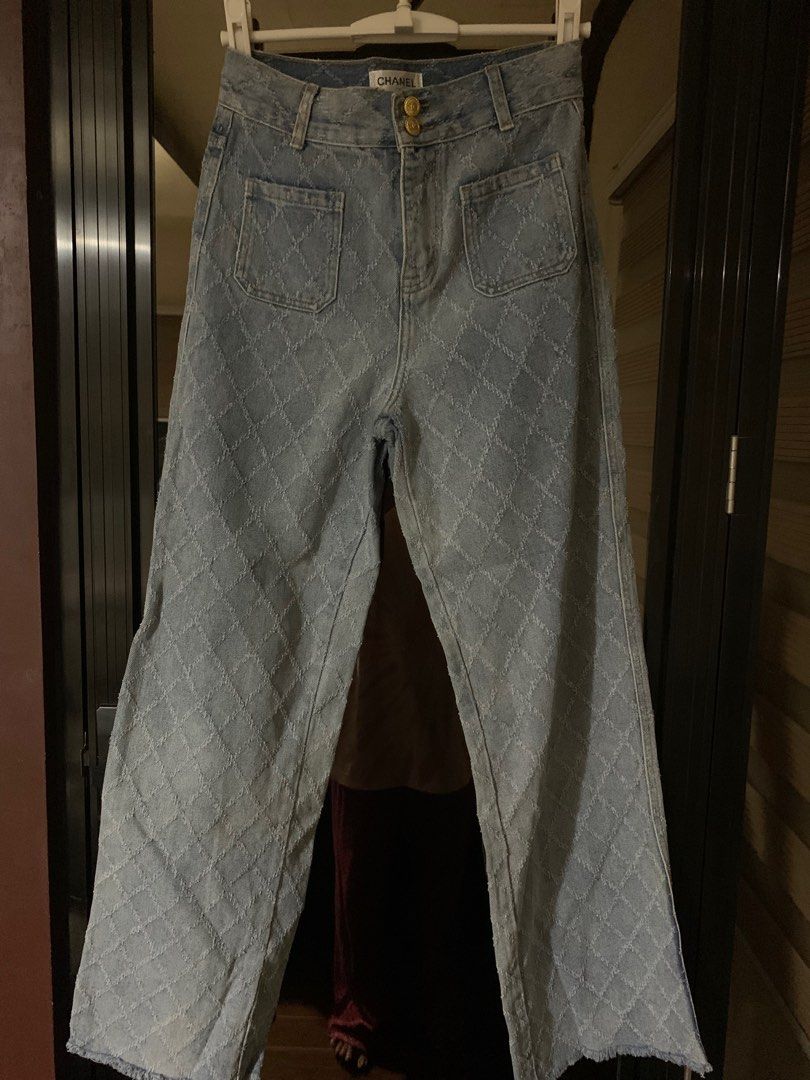 Chanel Diamond Pattern Jeans (Category: Luxury Apparel) located in Bulacan. Submitted by love2loved (Listing ID 1406770686, Image 2). Description: Stylish Chanel jeans featuring a unique diamond pattern. These jeans have a classic five-pocket design with a button and zipper closure. The jeans have a straight leg cut and are made of denim. The size is S. The jeans have a light blue color. The jeans have Chanel logo on the label. 28 to 29 inches wa