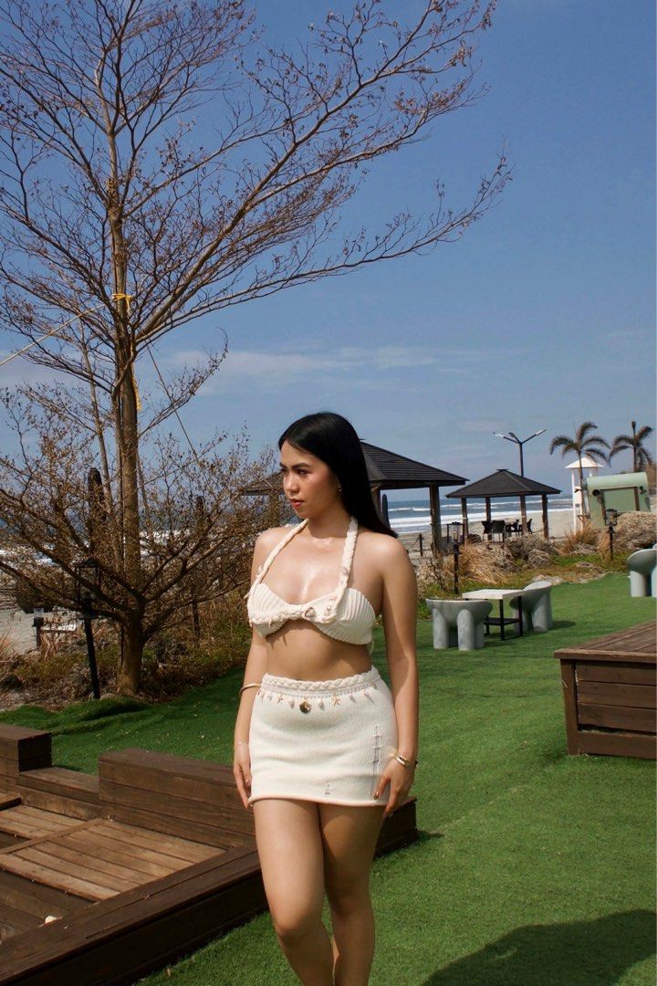 Cream Crochet Bikini Set (Category: Bikinis & Swimsuits) located in Alaminos. Submitted by cocoelatte_ (Listing ID 1406740452, Image 3). Description: - Cream-colored crochet bikini set - Halter neck top with seashell embellishments - Matching mini skirt - Ideal for beach or summer events - Handmade.