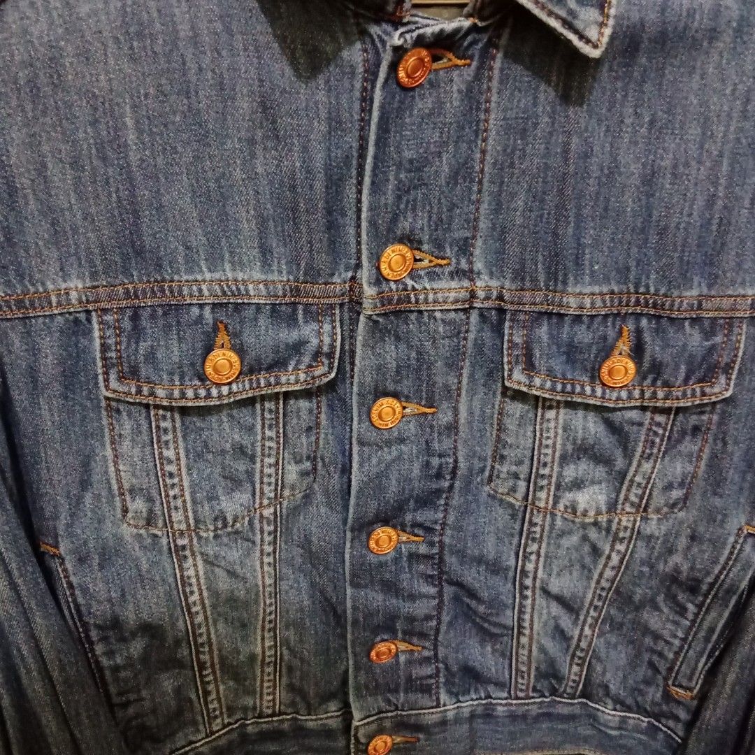 Denim Jacket (Category: Coats, Jackets and Outerwear) located in Shah Alam. Submitted by anyactr (Listing ID 1406791913, Image 2). Description: - Classic denim jacket - Medium wash - Button closure - Two chest pockets - Two side pockets - Standard collar - Long sleeves - Regular fit.