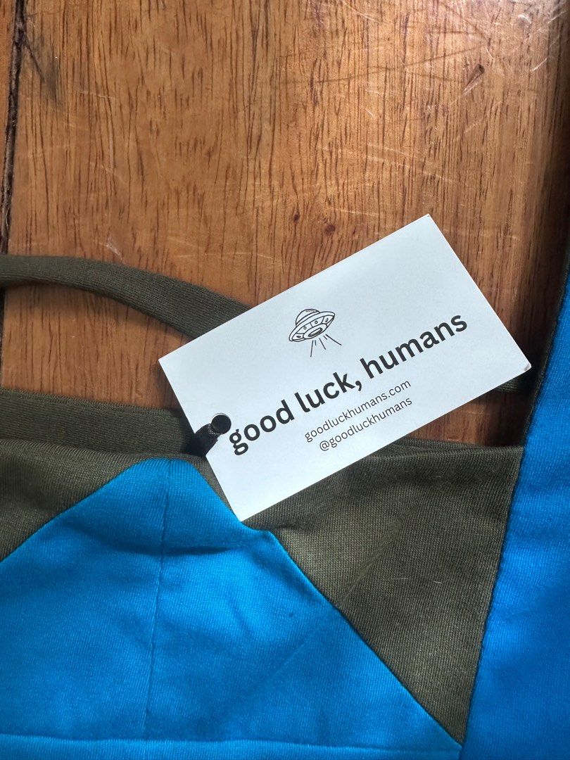 Good Luck Humans blouse (Category: Blouses) located in Paranaque City. Submitted by planetandy (Listing ID 1406698993, Image 2). Description: Brand new! Letting go as it’s a bit loose but I looove the design and color combination 💙💚 .