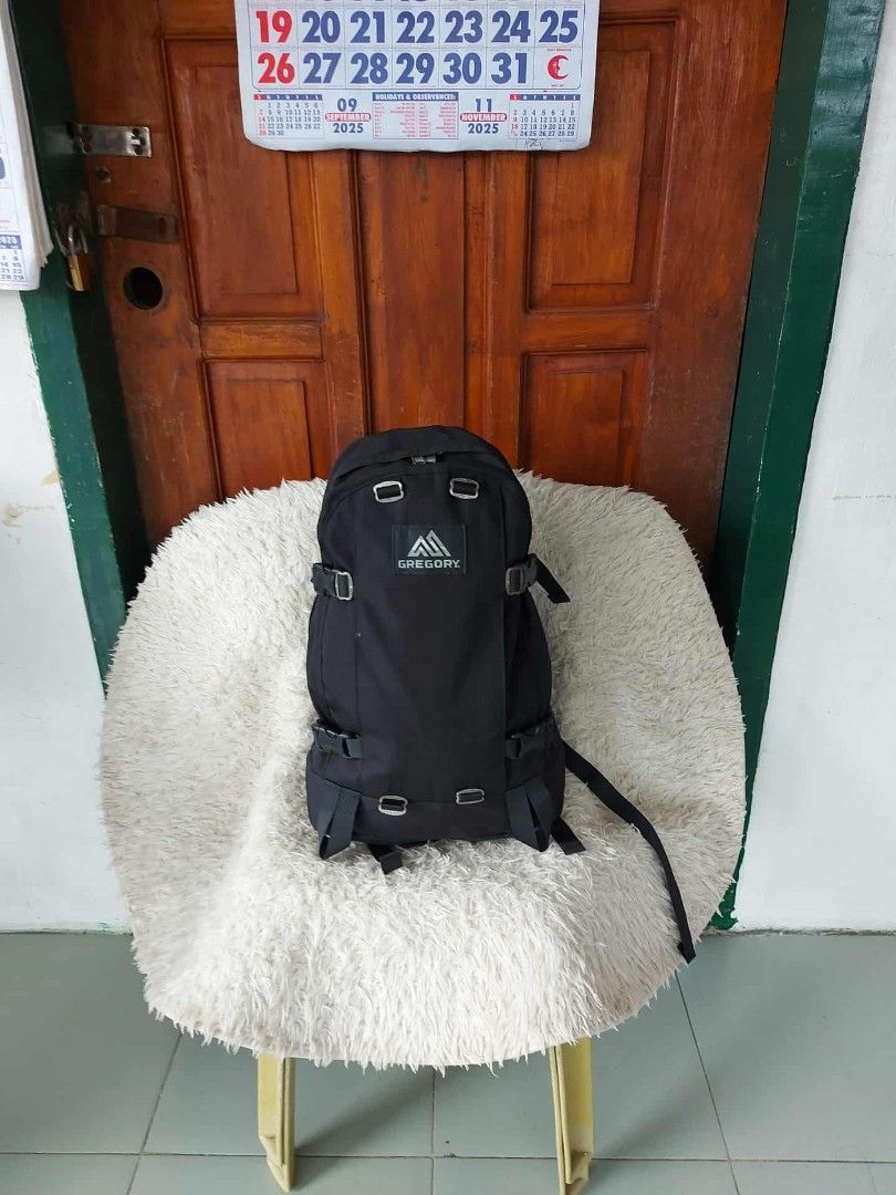 Gregory Black Backpack (Category: Backpacks) located in Manila. Submitted by youngforest-2089 (Listing ID 1406808753, Image 1). Description: - Black Gregory backpack - Multiple compartments for organization - Adjustable straps for a comfortable fit - Features the Gregory logo - Durable YKK zippers - Includes side straps and top handle - Interior zippered pocket.