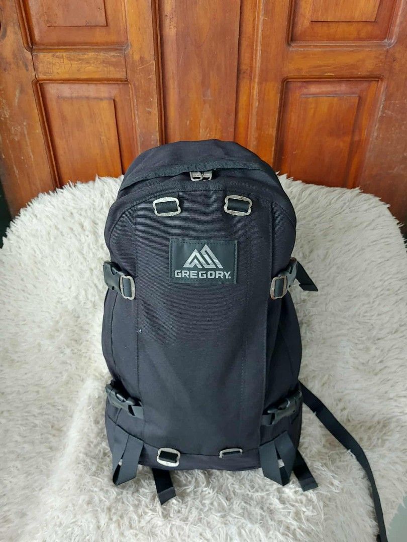 Gregory Black Backpack (Category: Backpacks) located in Manila. Submitted by youngforest-2089 (Listing ID 1406808753, Image 2). Description: - Black Gregory backpack - Multiple compartments for organization - Adjustable straps for a comfortable fit - Features the Gregory logo - Durable YKK zippers - Includes side straps and top handle - Interior zippered pocket.