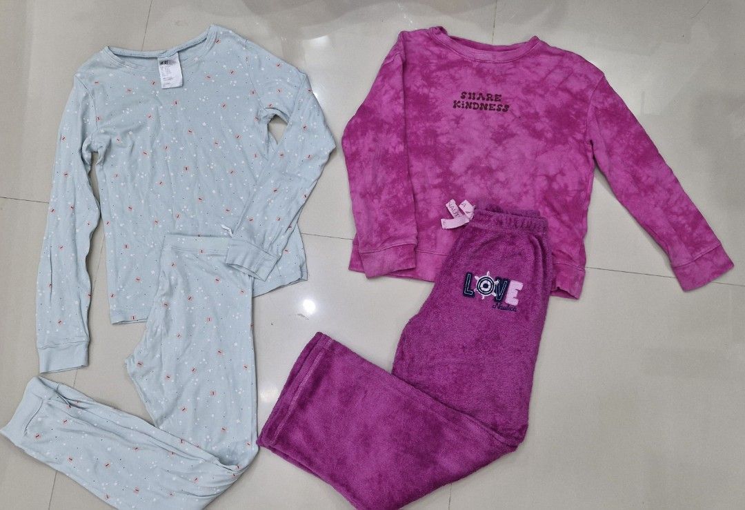 Take all H&M Pajama Set (Category: Babies & Kids Fashion) located in Malolos. Submitted by prelovedclothes_stuff (Listing ID 1406770498, Image 1). Description: - Pajama sets for sale! - Option 1: Light blue set with a dotted pattern. - Option 2: Pink set with "Share Kindness" top and "Love" pants. - Both sets include: - Long-sleeved top - Matching pants 6to8yo.