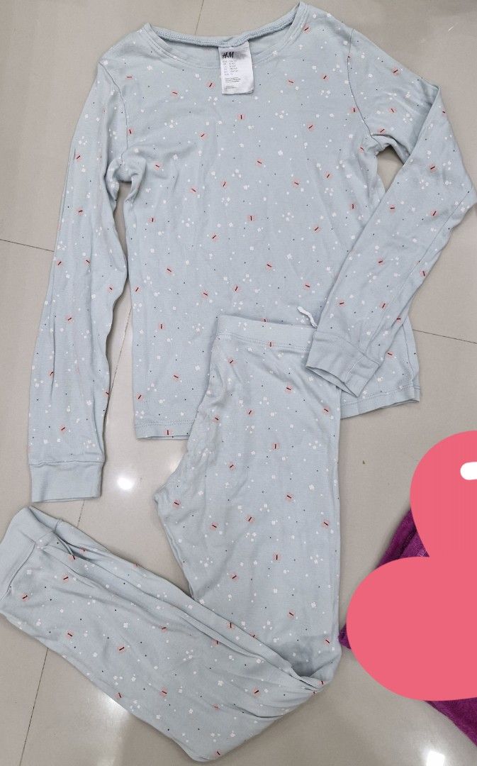 Take all H&M Pajama Set (Category: Babies & Kids Fashion) located in Malolos. Submitted by prelovedclothes_stuff (Listing ID 1406770498, Image 3). Description: - Pajama sets for sale! - Option 1: Light blue set with a dotted pattern. - Option 2: Pink set with "Share Kindness" top and "Love" pants. - Both sets include: - Long-sleeved top - Matching pants 6to8yo.