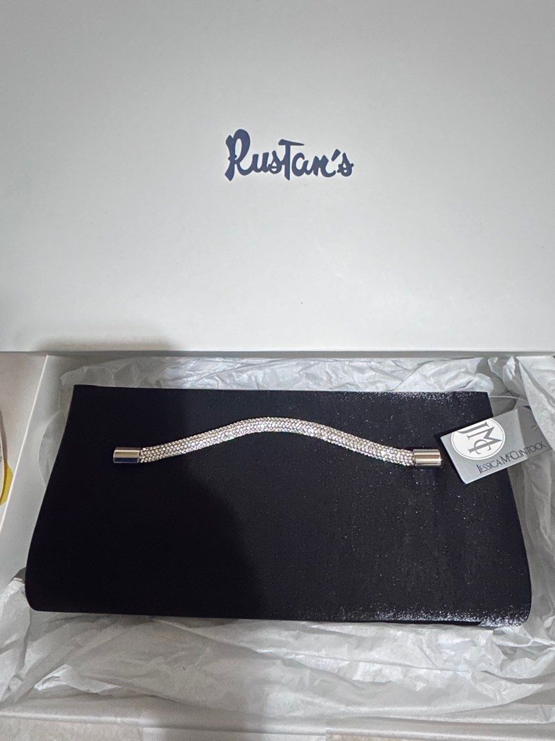 Jessica McClintock Black Clutch Bag (Category: Clutches) located in Manila. Submitted by vibeandcart (Listing ID 1406812665, Image 3). Description: - Jessica McClintock black clutch bag - Sparkling rhinestone handle - Detachable silver chain - Magnetic closure - Spacious interior - Includes original box from Rustan's - Ideal for special events.