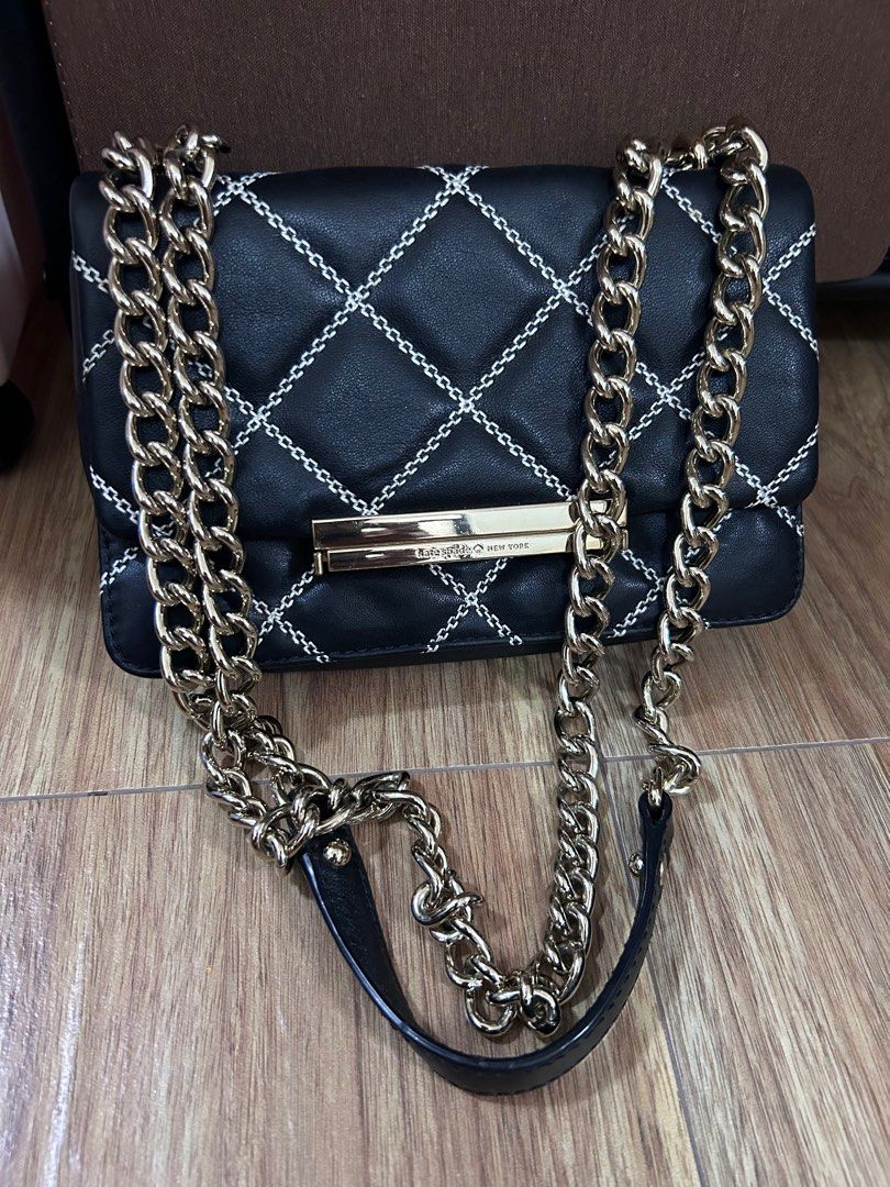Kate Spade New York Black Chain Bag (Category: Luxury Bags & Wallets) located in Manila. Submitted by mhainers (Listing ID 1406652164, Image 1). Description: - Authentic Kate Spade 2 way bag - Shoulder & handbag - White stitching detail - Pink fabric interior lining - Flap closure - Chain and leather strap - Classy & Elegant style - bought in Singapore (hindi maxado nagamit).
