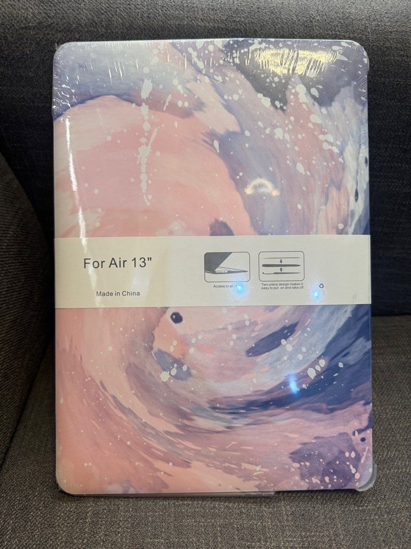 MacBook Air 13" Case (Category: Laptop Bags & Sleeves) located in Caloocan City. Submitted by basementbargain (Listing ID 1406645237, Image 1). Description: - Protective case for MacBook Air 13" - Two-piece design for easy installation and removal - Features a unique abstract watercolor design - Colors: Pink, blue, and white.