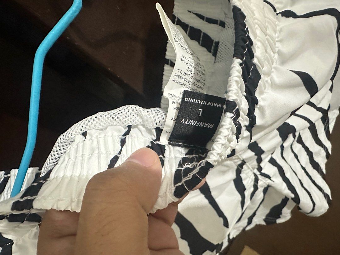 Manfinity Zebra Print Shorts - Size L (Category: Shorts) located in Manila. Submitted by drickkkk (Listing ID 1406790334, Image 2). Description: - Manfinity zebra print shorts - Size: L - Color: White with black stripes - Features: Elastic waistband - Perfect for casual outings and beach trips RFS: Isang beses lang nagamit pang Siargao -Shein - Ginamit lang pang tulog sa siargao - condition: 9.9/10 -Previously purchased for 549php.