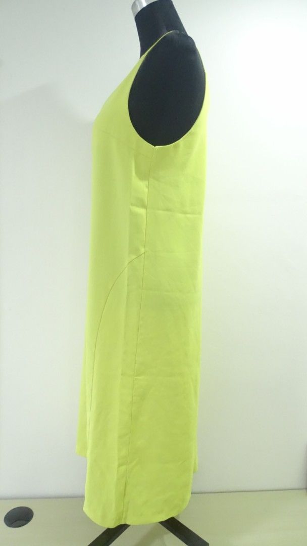 Manhattan Neon Yellow Dress (Category: Dresses) located in Bulacan. Submitted by aarchive (Listing ID 1406656474, Image 3). Description: - Fits Medium to Semi Large - Neon yellow dress - V-neck design - Unique strap detail on the back - Brand: Manhattan - Lightweight material - Simple and elegant style - Perfect for warm weather Please note color varies due to lighting, camera and display settings. MOP: Gcash/MAYA/BPI Shipping fee is shouldered b