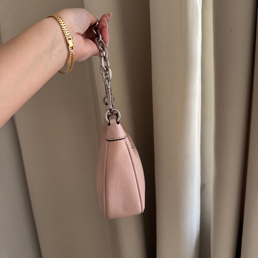 Mk cora mini sling bag pink (Category: Luxury Bags & Wallets) located in Tarlac. Submitted by kryssch (Listing ID 1406654515, Image 2). Description: super cute orig mk cora like new.