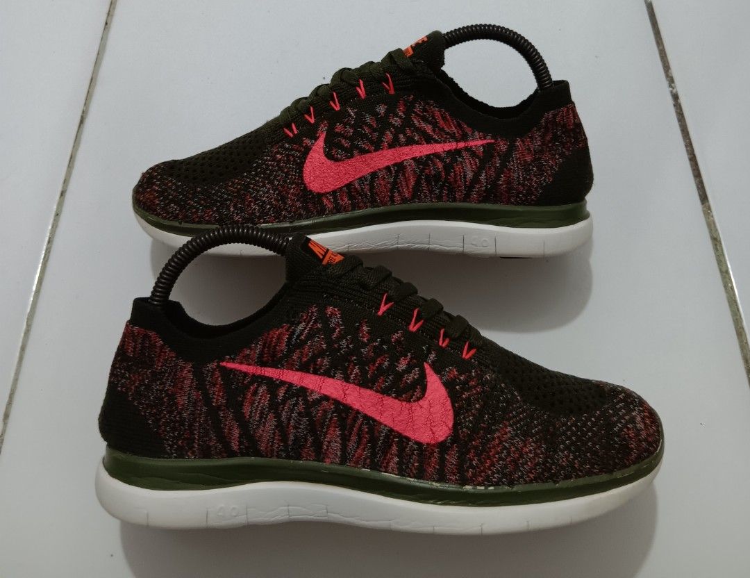 Nike Free 4.0 Flyknit Sneakers (Category: Sneakers) located in Dauis. Submitted by udenglegaspi (Listing ID 1406730731, Image 1). Description: - Nike Free 4.0 Flyknit sneakers - Color: Black, red, and green - Features Flyknit upper - Red Nike swoosh - White sole with black accents - Size: US 7, UK 6, EUR 39, 24 cm - Made in Vietnam.