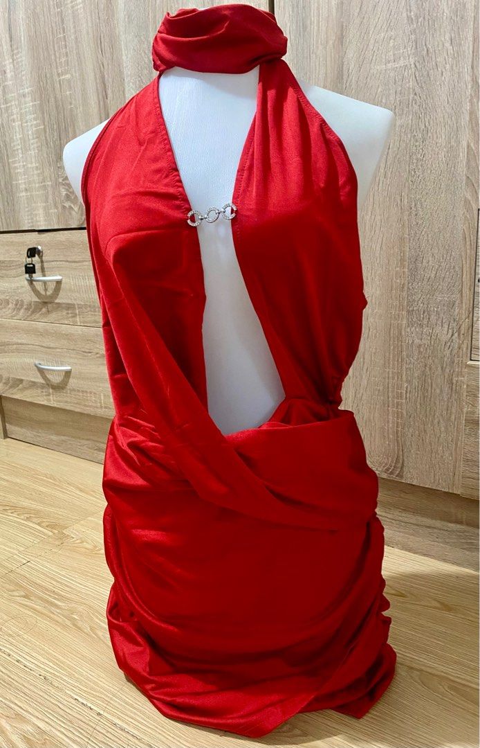 SHEIN Red Halter Neck Dress (Category: Dresses) located in San Pedro. Submitted by jen.declutter (Listing ID 1406655441, Image 1). Description: - Red halter neck dress - Unique draped front design - Decorative silver clasp - Ruched skirt detail - Ideal for special events.
