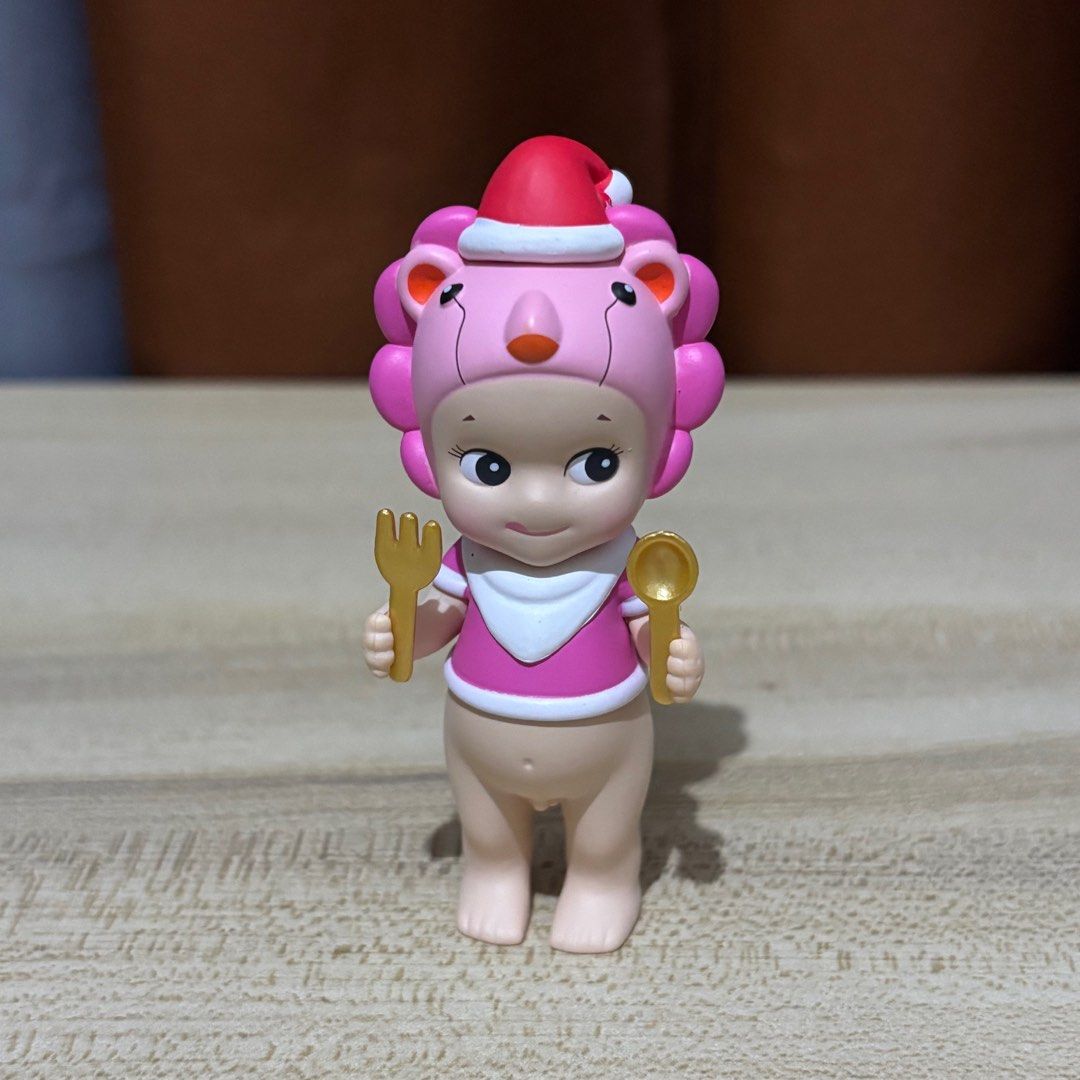 Sonny Angel Christmas Lion (Category: Designer & Blind Box Toys) located in Caloocan City. Submitted by taco.bella (Listing ID 1406767193, Image 1). Description: - Adorable Sonny Angel figurines. - Includes: Pink Lion Santa with fork and spoon. - Collectible figures. - Great for display or gifting..