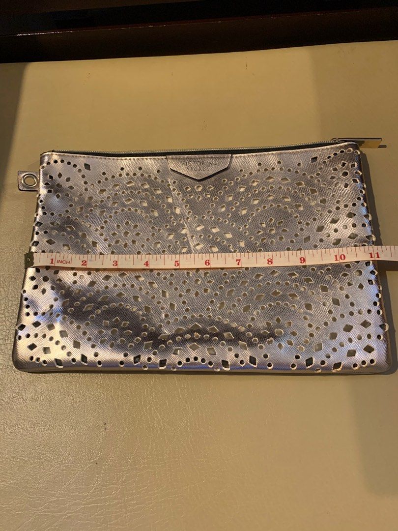 Victoria's Secret Silver Clutch (Category: Clutches) located in Las Pinas. Submitted by joy12c (Listing ID 1406690152, Image 2). Description: Victoria’s Secret Clutch Bag Location : BF Resort Las Piñas.