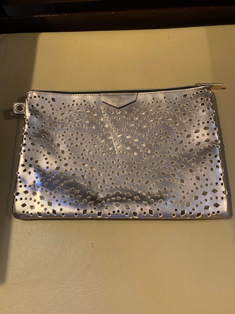 Victoria's Secret Silver Clutch (Category: Clutches) located in Las Pinas. Submitted by joy12c (Listing ID 1406690152, Image 3). Description: Victoria’s Secret Clutch Bag Location : BF Resort Las Piñas.