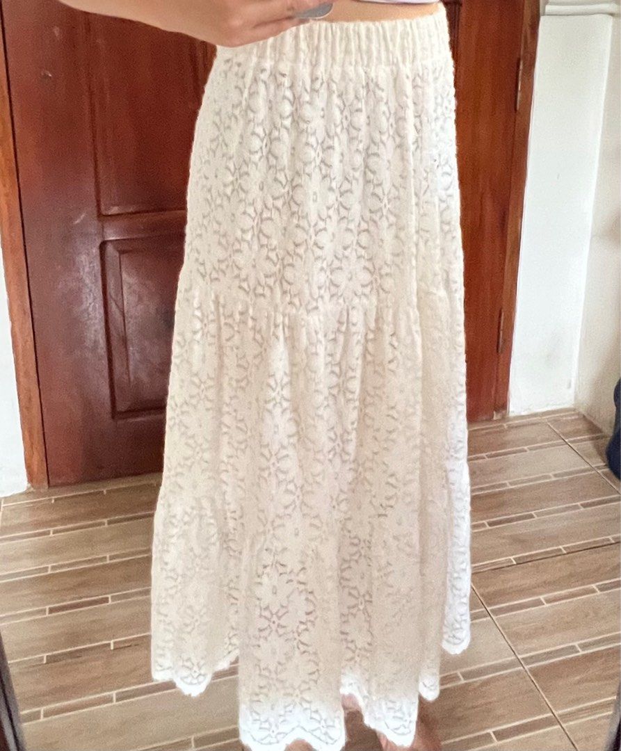White Lace Maxi Skirt (Category: Skirts) located in Tuguegarao City. Submitted by aimurmere (Listing ID 1406689311, Image 2). Description: White Lace Tiered Maxi Skirt Can fit S-L. Has elastic waist band, has inner lining. No flaws, just declutterring. Rarely worn. Got it from an ig shop. Waist (laid flat): 13 inches, can stretch up to 19.5 inches Length: 32 inches Fixed price. J&T delivery. GCash only..