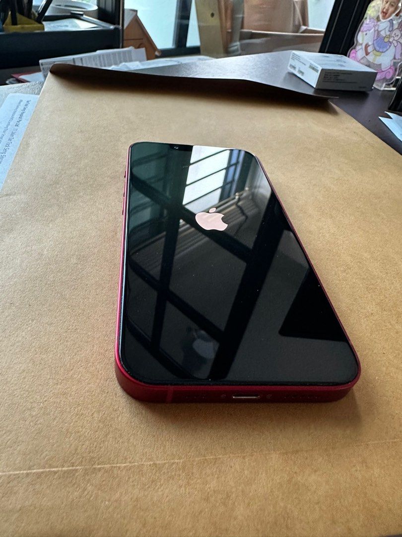 (Category: iPhone 13 Series ) located in Singapore. Submitted by jerl (Listing ID 1406868494, Image 3). Description: - Screen and back are clean and glossy. Screen has a tempered glass - No scratches or dents. - Phone with box.