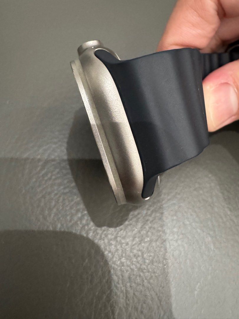 Apple Watch Ultra 49mm Titanium Midnight Ocean Band (Category: Wearables & Smart Watches) located in Singapore. Submitted by louis2209 (Listing ID 1406824480, Image 3). Description: Selling a used Apple Watch Ultra. It has a titanium case and a midnight ocean band. The battery health is at 89%. Comes with the original box..
