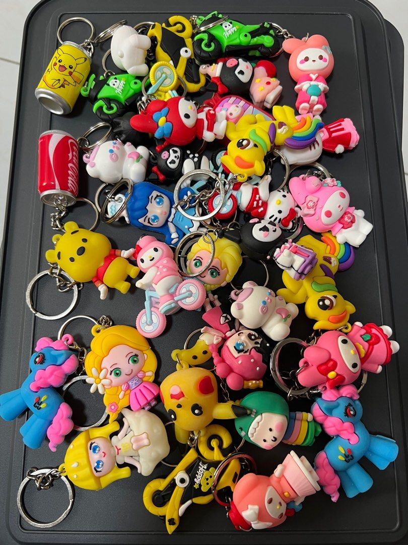 Assorted keychains (Category: Character Goods) located in Singapore. Submitted by applekitty2727 (Listing ID 1406834238, Image 1). Description: Clearing the keychains of 34 pieces. Selling at $20. Self collect at postal 141080 Payment - cash or Paynow.