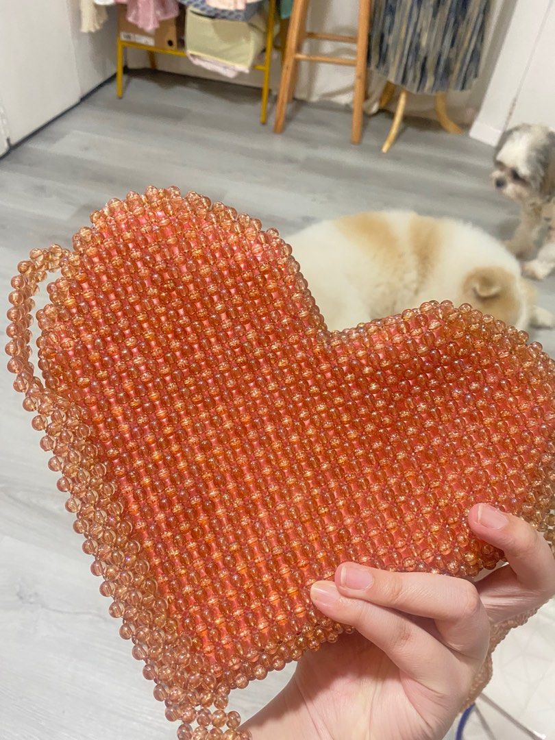 Beaded Heart Pink Bag (Category: Cross-body Bags) located in Pasig City. Submitted by snowmana.ph (Listing ID 1406873234, Image 1). Description: I purchased this from IG who customized beaded bags. If I remember correctly this cost me 800 to 1000 plus. Used once but zipper not working or damaged after using it from my trip. Selling area: Metro Manila only. Reason for Selling: Decluttering. Mode of Payment: GCash. Self-book delivery preferred. Ple