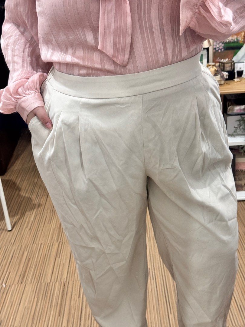 Beige Khaki Garterized Pants - Plus size 3XL (Category: Sets or Coordinates) located in Makati City. Submitted by mhilesposadas (Listing ID 1406990490, Image 1). Description: - Beige high-waisted pants - Pleated front - Relaxed fit - Perfect for a chic and comfortable outfit.
