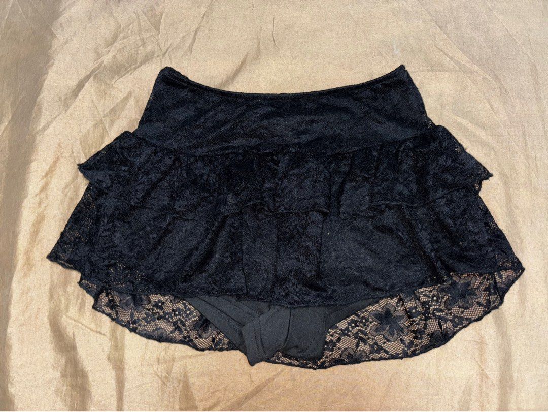Black Lace Ruffle Mini Skirt (Category: Skirts) located in Angono. Submitted by kalidope (Listing ID 1406991137, Image 2). Description: - Black mini skirt - with inner shorts - Layered lace ruffle design - Fitted waistband - Short length - Delicate lace fabric - Ideal for special occasions - Versatile styling options.
