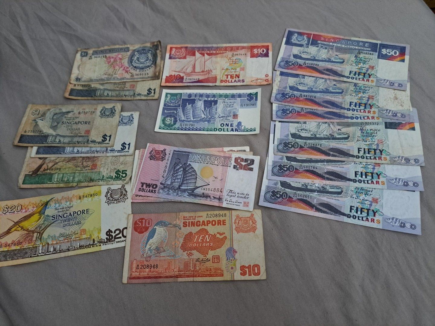 Clearing old notes (Category: Currency) located in Singapore. Submitted by SleepNbreathing (Listing ID 1406825142, Image 1). Description: clearing old notes. charging 5% to 10% extra for each notes. still have more notes .feel free to ask.