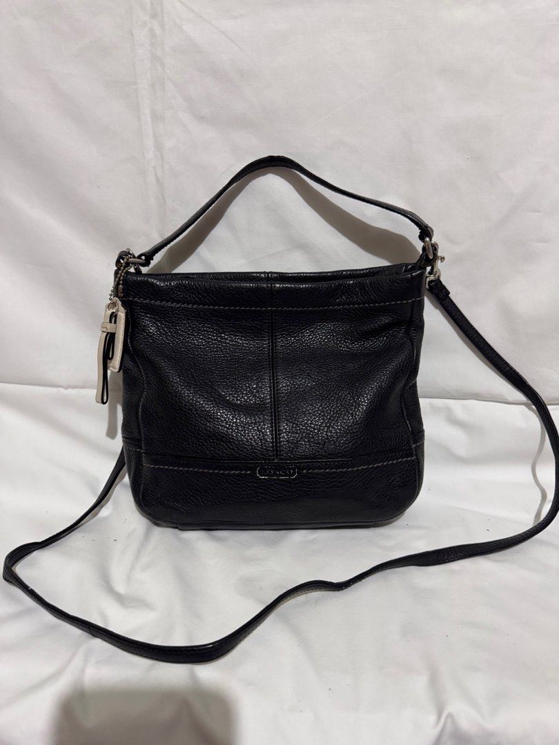 Coach Black Leather Crossbody Bag (Category: Luxury Bags & Wallets) located in Makati City. Submitted by tybexpress (Listing ID 1406989647, Image 1). Description: Decluttering! With chip on rubber lining but not noticeable since the bag is black - genuine all leather - needs cleaning inside pag maselan ka - Authentic Coach crossbody bag - Main compartment with green lining - Interior pocket - Detachable Coach tag - Top handle and adjustable strap