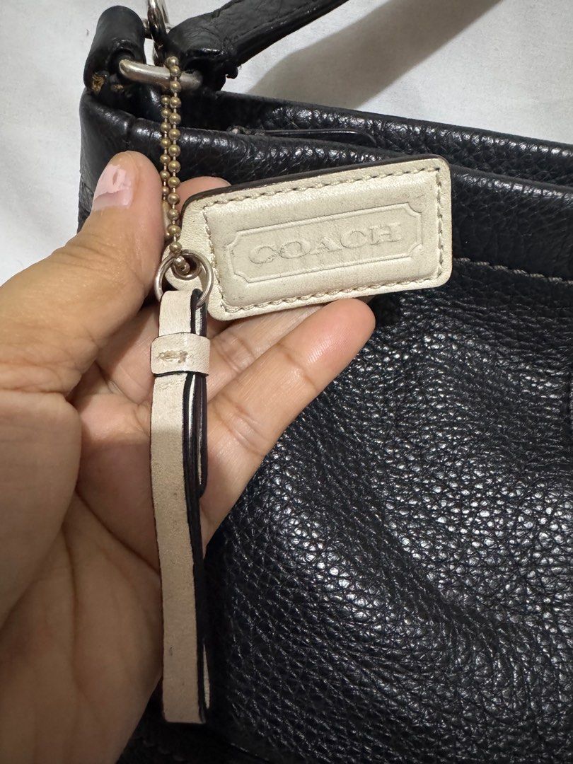 Coach Black Leather Crossbody Bag (Category: Luxury Bags & Wallets) located in Makati City. Submitted by tybexpress (Listing ID 1406989647, Image 2). Description: Decluttering! With chip on rubber lining but not noticeable since the bag is black - genuine all leather - needs cleaning inside pag maselan ka - Authentic Coach crossbody bag - Main compartment with green lining - Interior pocket - Detachable Coach tag - Top handle and adjustable strap