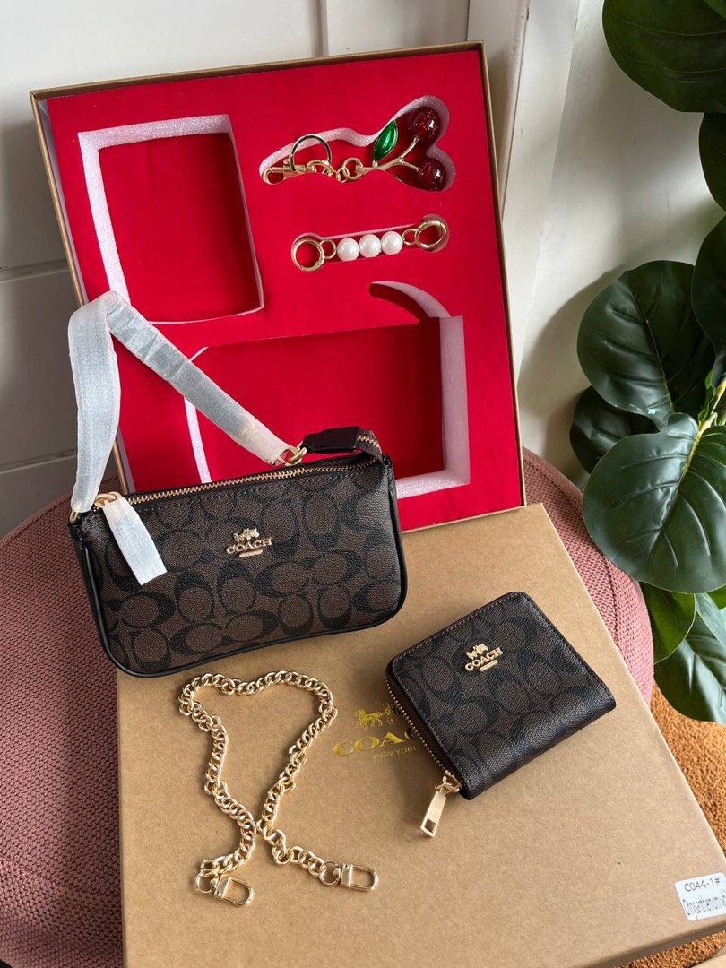 Coach Gift Set with Bag and Wallet (Category: Luxury Bags & Wallets) located in Batangas. Submitted by wornbyiani (Listing ID 1406939373, Image 3). Description: CCH Nolita Set 🐻 Inclusions: 🍒 Cherry Charm 🍒 Bag extender 🍒 Nolita 19 🍒CCH Wallet Open for Pre-Orders only!.