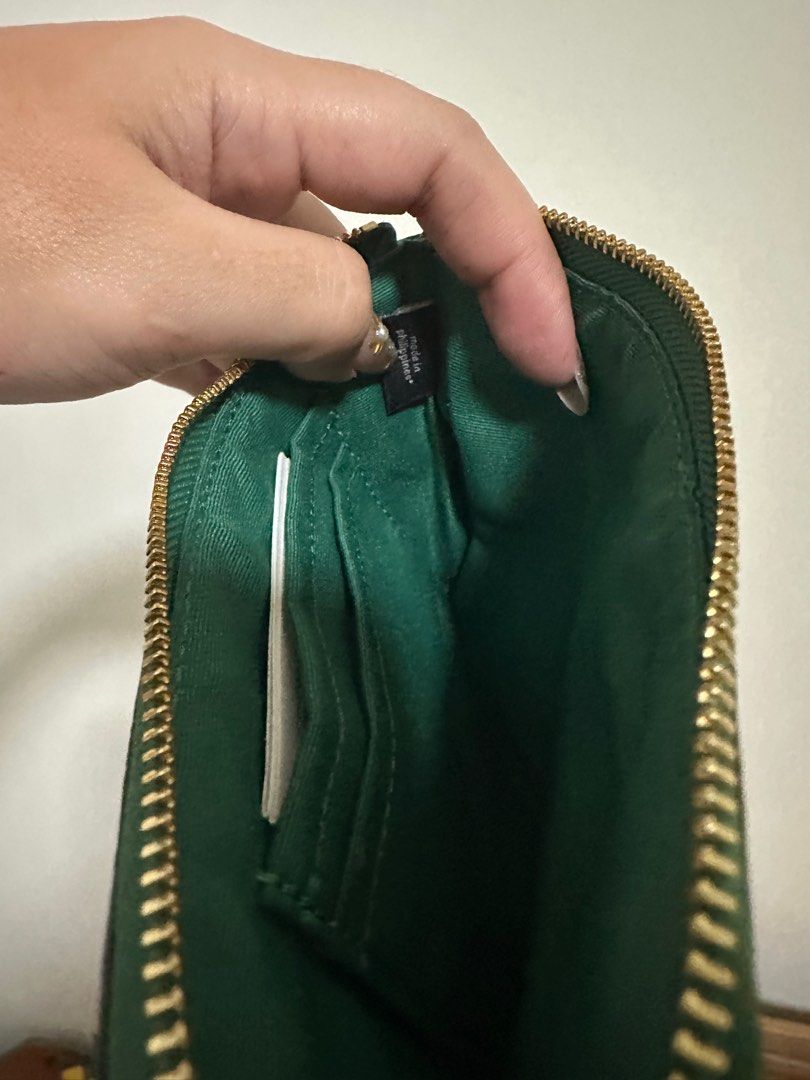 Coach Green Small Zip Wristlet (Category: Luxury Bags & Wallets) located in Pasig City. Submitted by xxserendipityxx (Listing ID 1406946561, Image 2). Description: - Authentic Coach coin purse - Eye-catching vibrant green color - Features a gold zipper and Coach logo - Interior includes multiple card slots - Stylish and compact design.