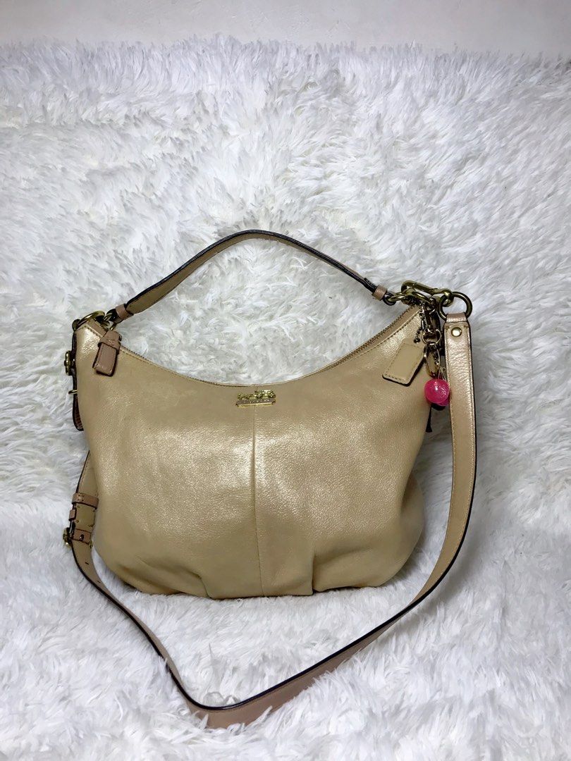 Coach Hobo Bag with Charm (Category: Luxury Bags & Wallets) located in Manila. Submitted by oddearth-e17a (Listing ID 1406845541, Image 3). Description: Pre-loved items,in good conditions.