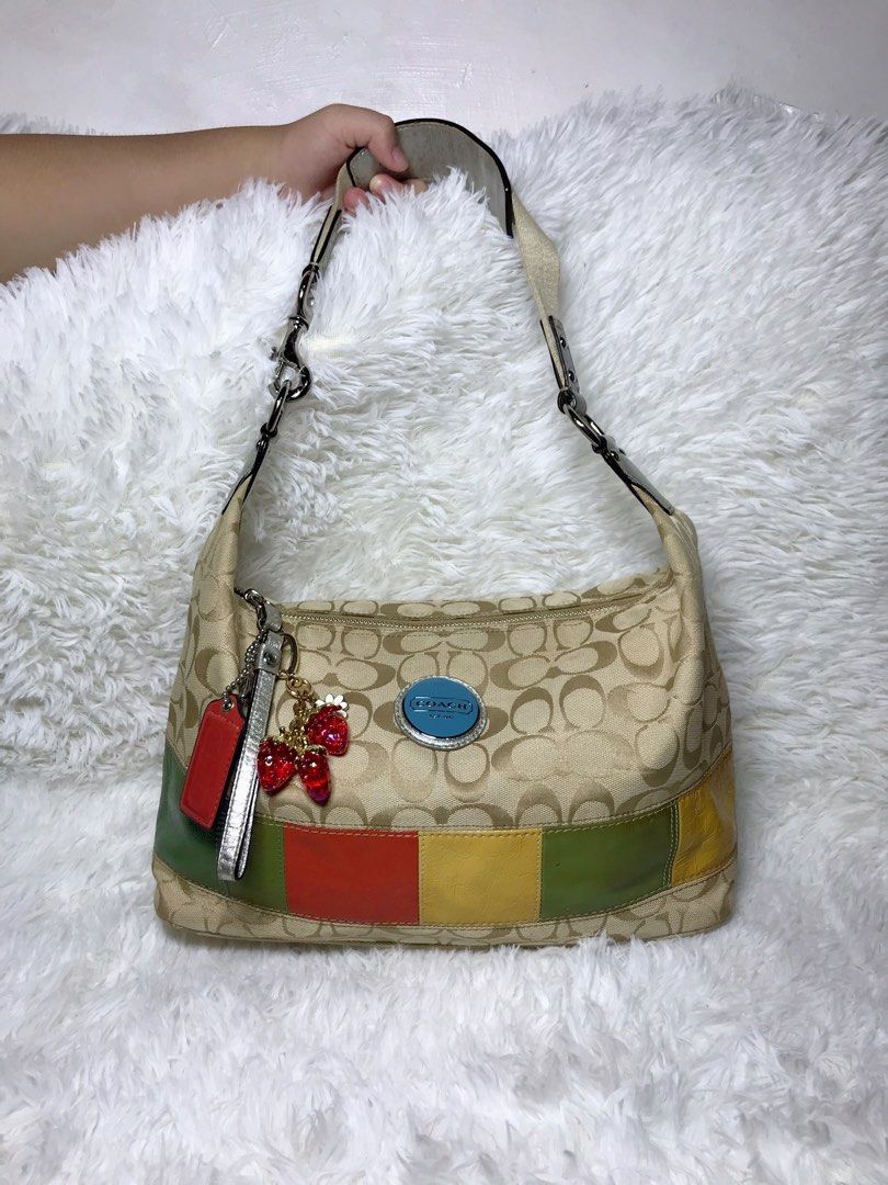 Coach Hobo Bag with Charm (Category: Luxury Bags & Wallets) located in Manila. Submitted by oddearth-e17a (Listing ID 1406845541, Image 1). Description: Pre-loved items,in good conditions.